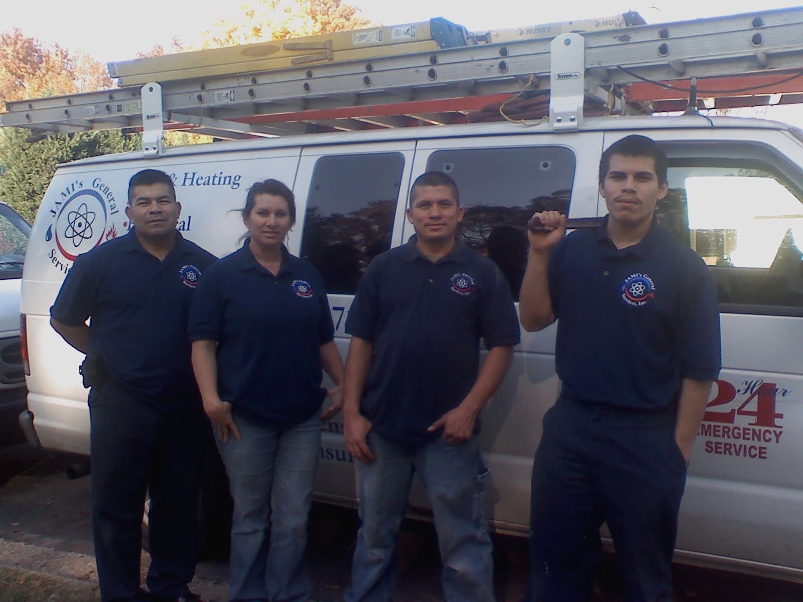 The Jamis team in front of the work van